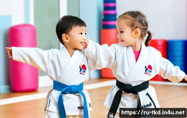 태권도 유아 클래스 장점 - A lively indoor taekwondo class for toddlers wearing colorful protective gear and comfortable sports...